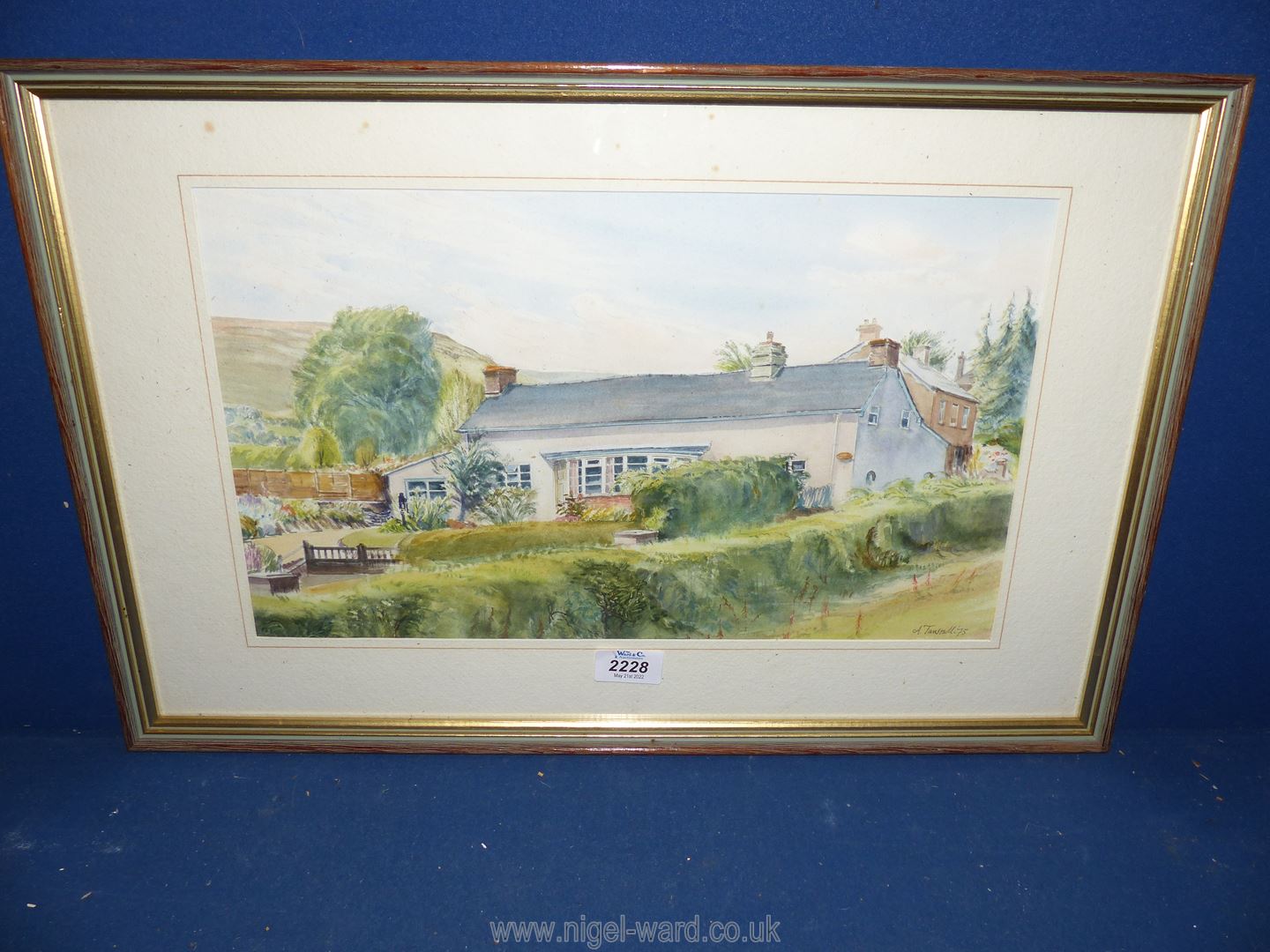 A framed and mounted watercolour, signed lower right A.