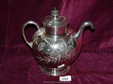 A white metal 'Royles Patented Self Pouring' teapot with floral engraved decoration.