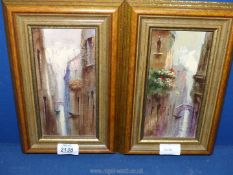 A pair of framed Oils of continental scenes (probably Venice) of houses and bridges over canals.