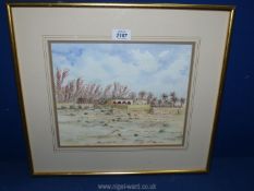 A framed and mounted red Ink and wash painting titled verso 'Adobe Mosque,