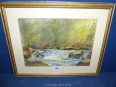 A framed and mounted Watercolour depicting a river scene and cascading waterfall, signed Arthur C.