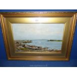 An oil painting of a coastal scene, signed Stuart Rutherford, R.A. label on the back.