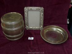 A silver plated Biscuit Barrel, frame and a plate.