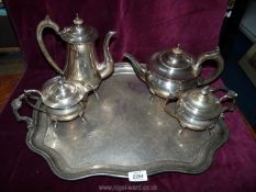 An Epns hot water jug, teapot, tea for one pot and sucrier on paw feet,