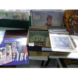 A box of 1960's and later vinyl 33 and 45 rpm records: Genesis, The Who, Beatles etc.