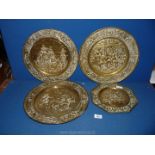 Three wall hanging brass chargers with tavern and ship scenes plus a smaller octagonal wall hanging