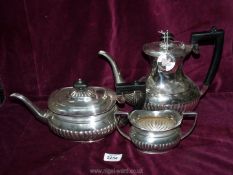 A Sheffield EPNS teapot, coffee pot and sugar bowl.