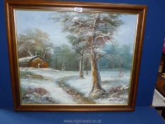 An Oil on canvas of a snowy woodland scene by Whitman