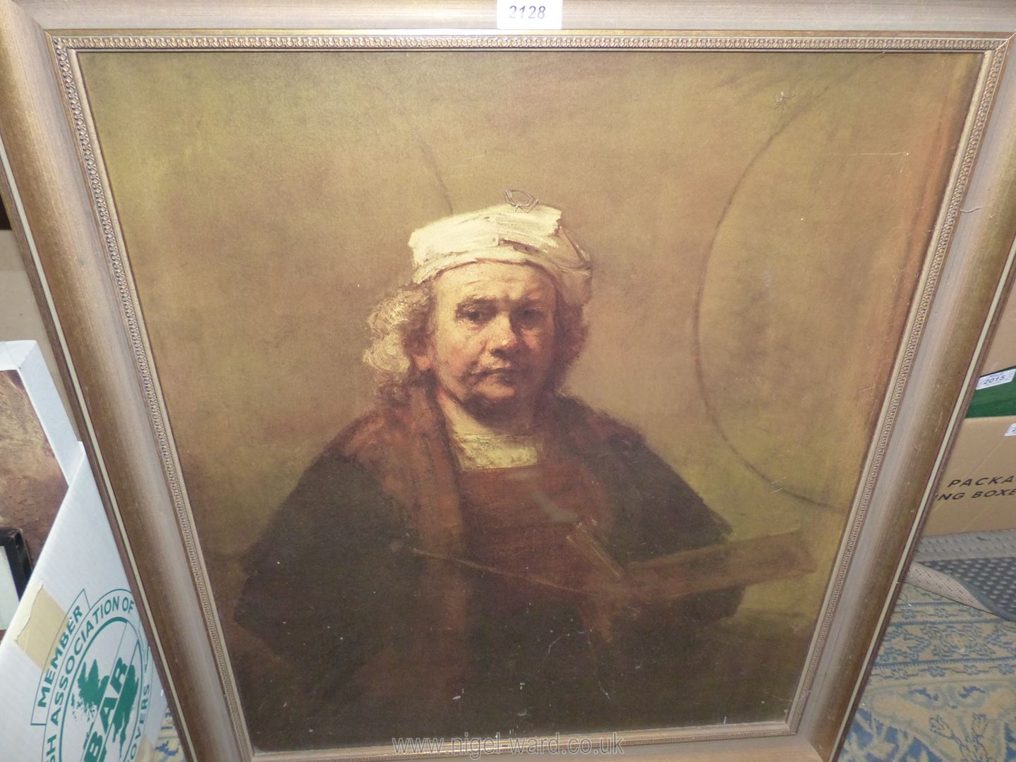 A large framed Print on board, a portrait of the artist Rembrandt Van Rijn, 26" x 30 1/4".