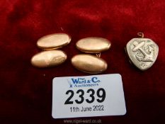A pair of oval 9 ct gold cufflinks stamped Birmingham,