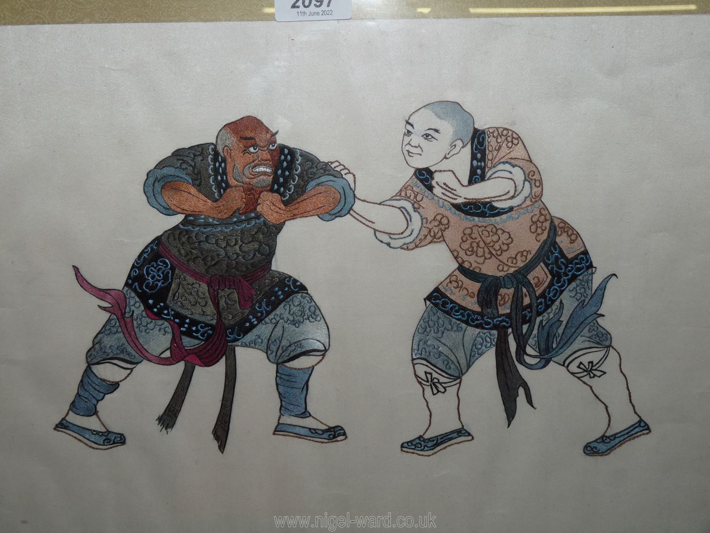An Oriental embroidery of wrestlers. - Image 2 of 7