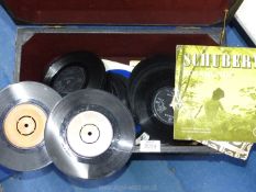 A small wooden trunk of unsleeved 45 rpm records including Tom Jones, The Shadows,