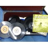 A small wooden trunk of unsleeved 45 rpm records including Tom Jones, The Shadows,