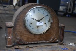 An old chiming mantel clock, in need of restoration.