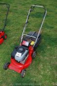 A Rover Powerstart Deluxe lawn mower with Briggs & Stratton engine, (engine turns,