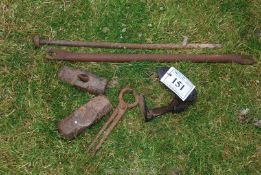 Shoe lasts, 2 sledge hammer heads, pincers, stabiliser bar, steel spike.