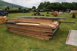 A flat-packed 2 bay wooden horse/pony field shelter, requires roof material.
