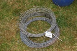 2 rolls of galvanised fencing wire.