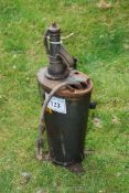 An oil dispensing bucket.