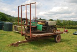 A hydraulic tipping trailer with bale extension thripple frame.
