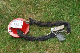 A motorcycle security lock and chain.