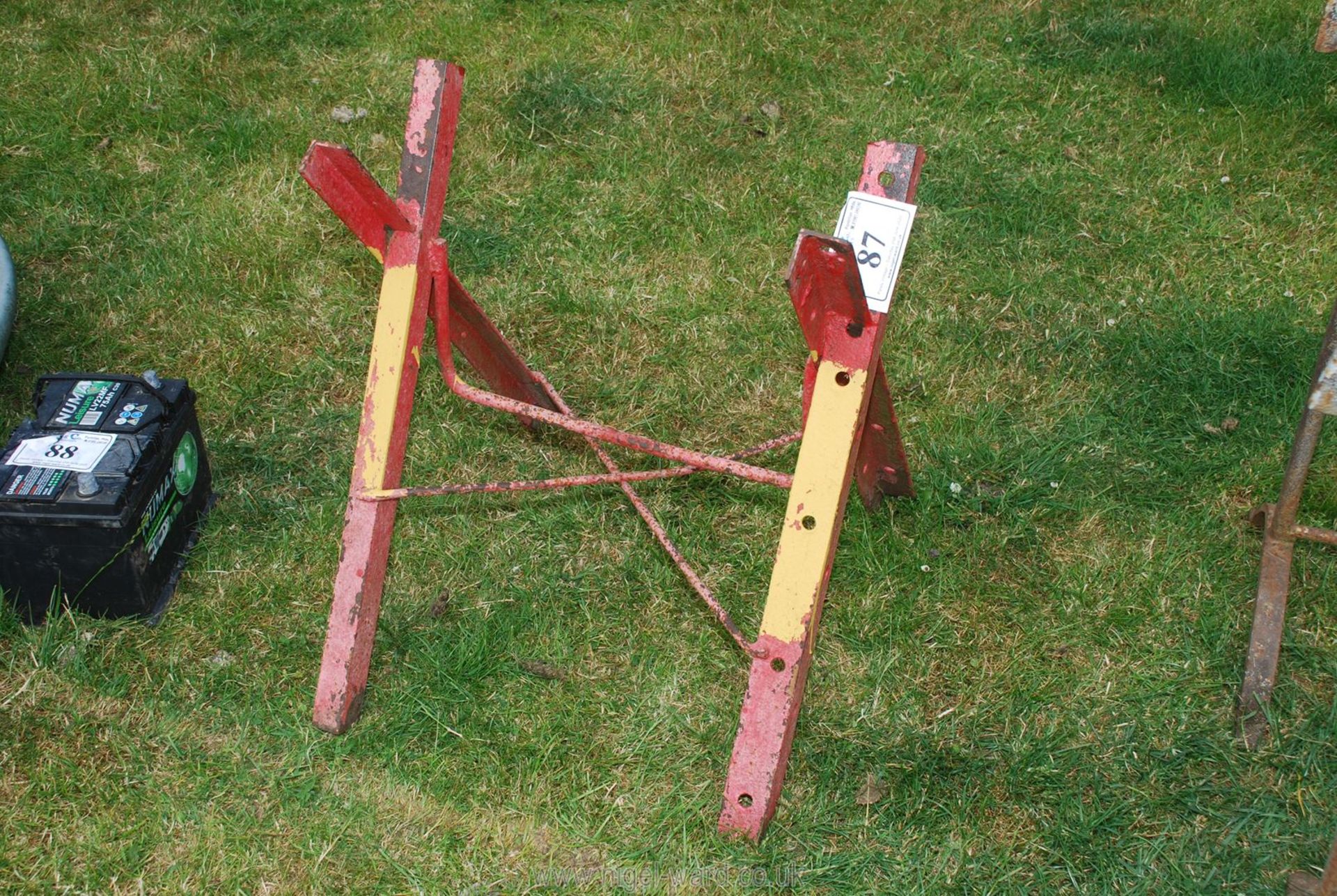 A heavy duty steel sawing horse.