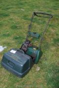 An Atco Commander B17 cylinder mower with grass collector box, engine turns.