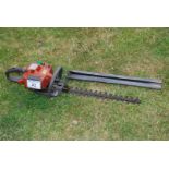 A Husqvarna 225H60 hedge trimmer. Ran at time of lotting.