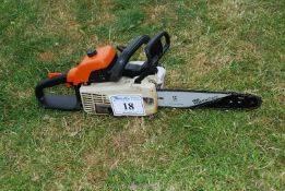 A Stihl MS 200 chainsaw with chain-brake, good compression. Ran at time of lotting.