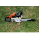 A Stihl MS 200 chainsaw with chain-brake, good compression. Ran at time of lotting.