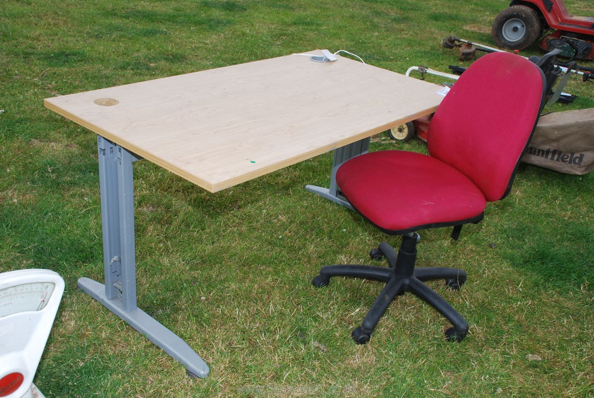 A computer desk and chair.