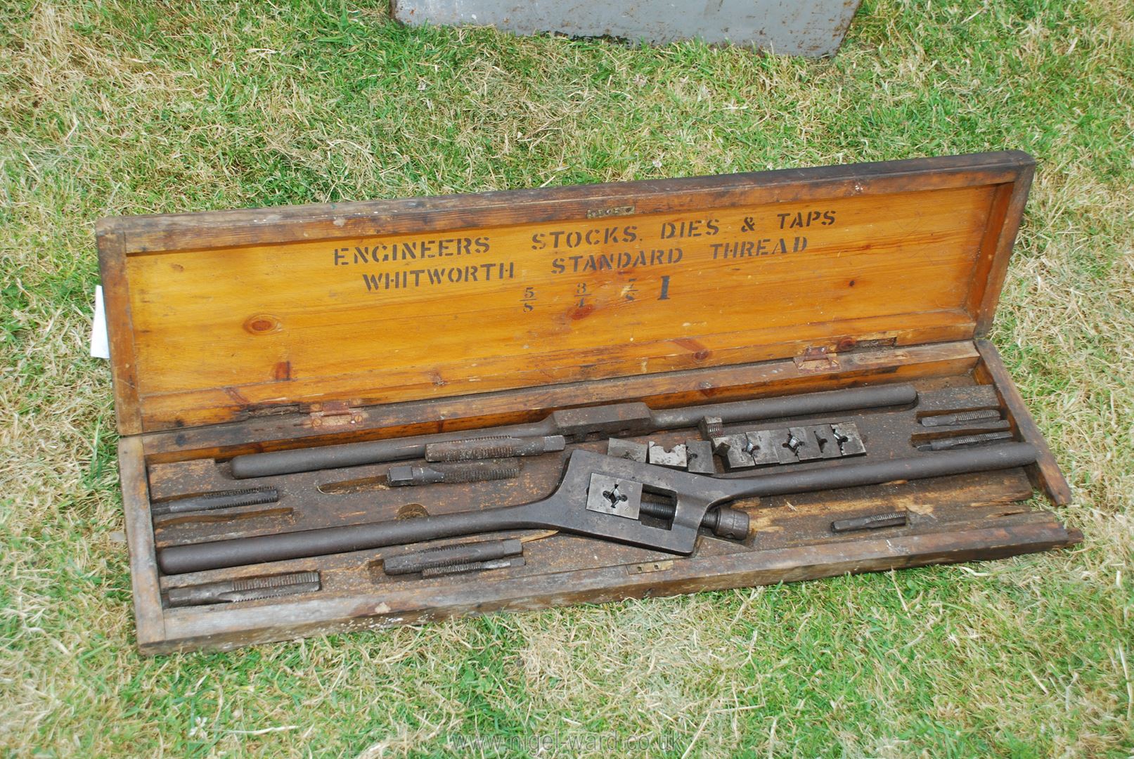 A Wooden cased large tap and die set.