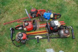 Six petrol Hedge trimmers, (sold as seen). Several have good compression.