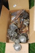 A box of brass and other lamps, wiper motor, oil can, scales, door bolts, mirrors, etc.
