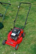 A Rover Raider self-propelled mower (no grass box), engine very tight - sold as seen.