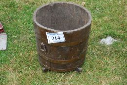 A wooden coal bucket.