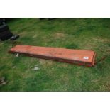 A Howard muck spreader lid, 10' long approx.