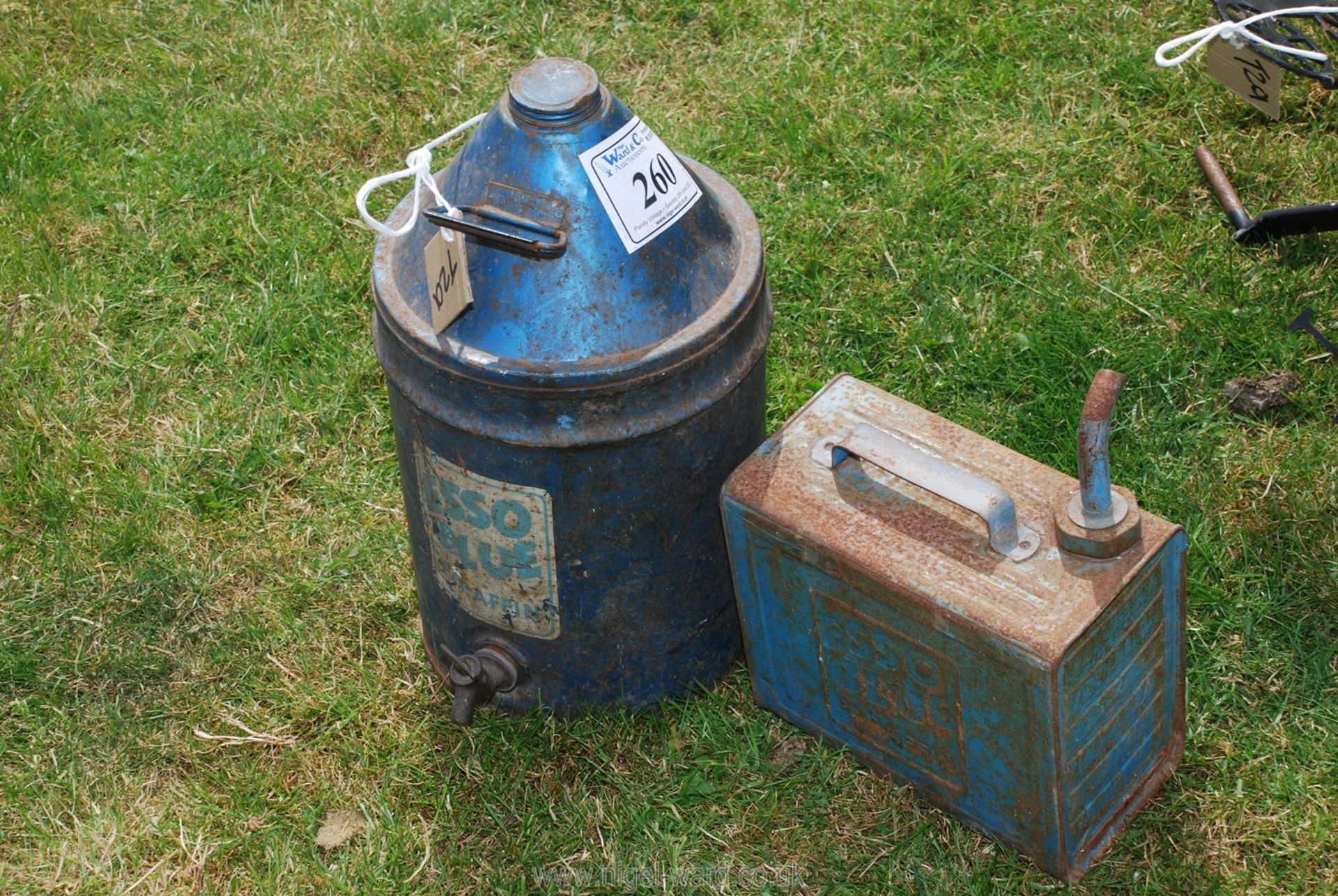 A blue Esso paraffin drum and tap with a blue Esso rectangular tin.