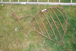 A corner hay rack and tripod.