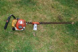 A Tanaka THT-2540 petrol engined hedge trimmer. Ran at time of lotting.