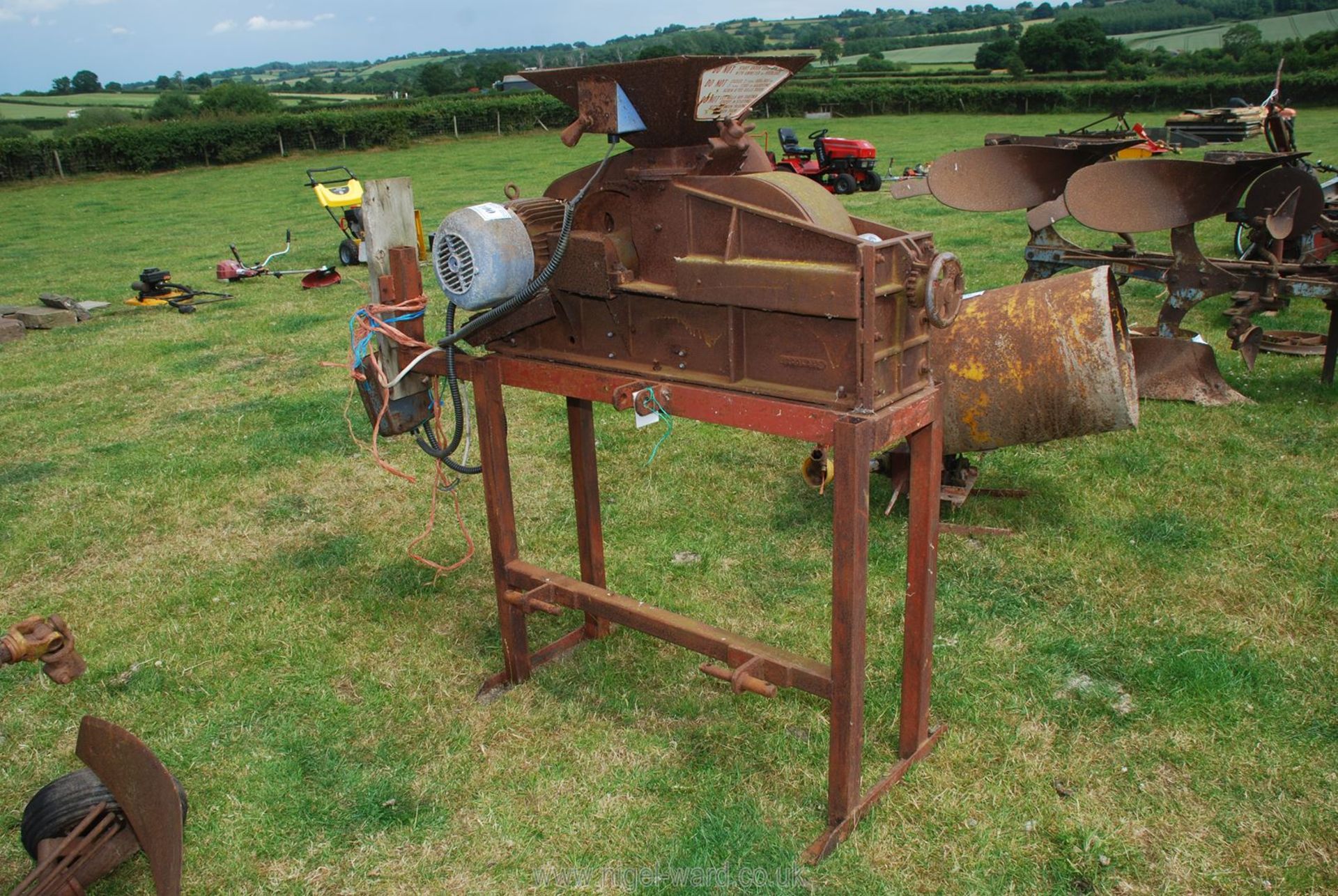 A Bentall roller mill on steel stand