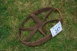 A blacksmith made wrought iron wheelbarrow wheel.