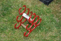 A Horseshoe wine rack.