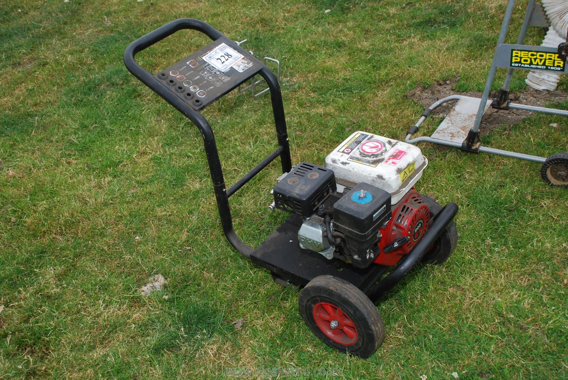 A 4 stroke engine high pressure washer - sold as seen.