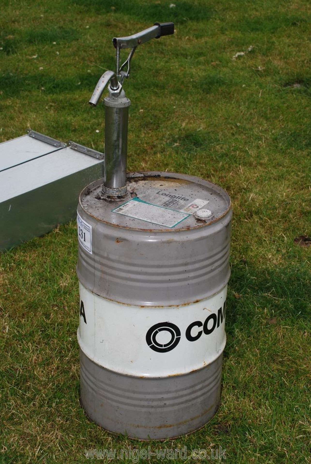 An oil drum with pump - empty.
