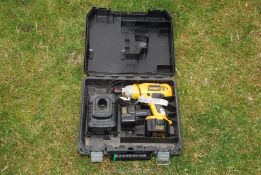 A Dewalt cordless impact drill, boxed.