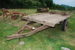 A single axle harvest trailer, 12'1" x 6' wide.