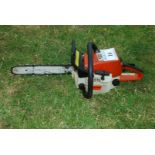 A Stihl 021 chainsaw with chain-brake, good compression. Ran at time of lotting.