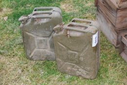 Two jerry cans, 1951 and 1976.