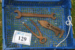 An adjustable spanner, a pincers and an open ended spanner with measuring marks.